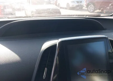 2021 Toyota Prius Prime Limited z USA, uszkodzony, nr VIN JTDKAMFP5M3195132